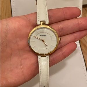 White leather and gold Bulova watch